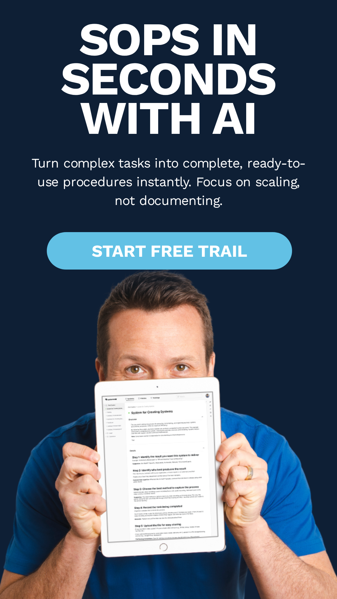 David Jenyns holding a tablet displaying a systemHUB standard operating procedure